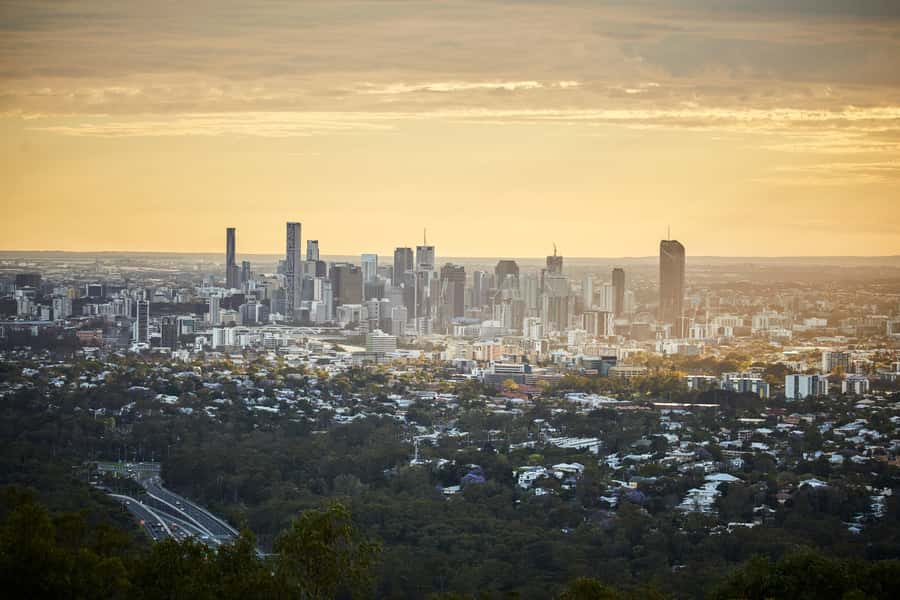 Brisbane Bus Tour: City highlights | Small group | Snack - Crossing Story Bridge toward New Farm