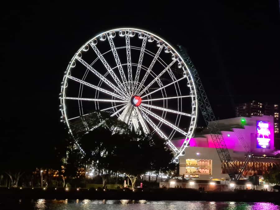 Brisbane: Sunset City Lights Cruise 5.30pm or 6pm <em>seasonal – Key points at a glance’ /></p>
<ul>
<li><strong>Sunset changes by season:</strong> Depart at 5:30pm from April through September, or 6pm from October through March.</li>
<li><strong>The city lights are the main event:</strong> The return stretch is especially attractive as Brisbane begins to glow.</li>
<li><strong>A charcuterie board is included:</strong> You receive a complimentary share platter, while drinks and extra snacks cost more.</li>
<li><strong>Story Bridge and Kangaroo Cliffs feature prominently:</strong> The route gives you a pleasant river-level view of Brisbane’s major sights.</li>
<li><strong>The mood is relaxed, not educational:</strong> Music replaces live commentary, so this suits quiet sightseeing more than a narrated tour.</li>
<li><strong>Meet at South Bank:</strong> Boarding is at the Cultural Centre Public Pontoon, in front of the cultural centre.</li>
</ul>
<h2 id="what-this-brisbane-evening-cruise-is-really-like">What this Brisbane evening cruise is really like</h2>
<p><img width="900" height="703" decoding="async" src=