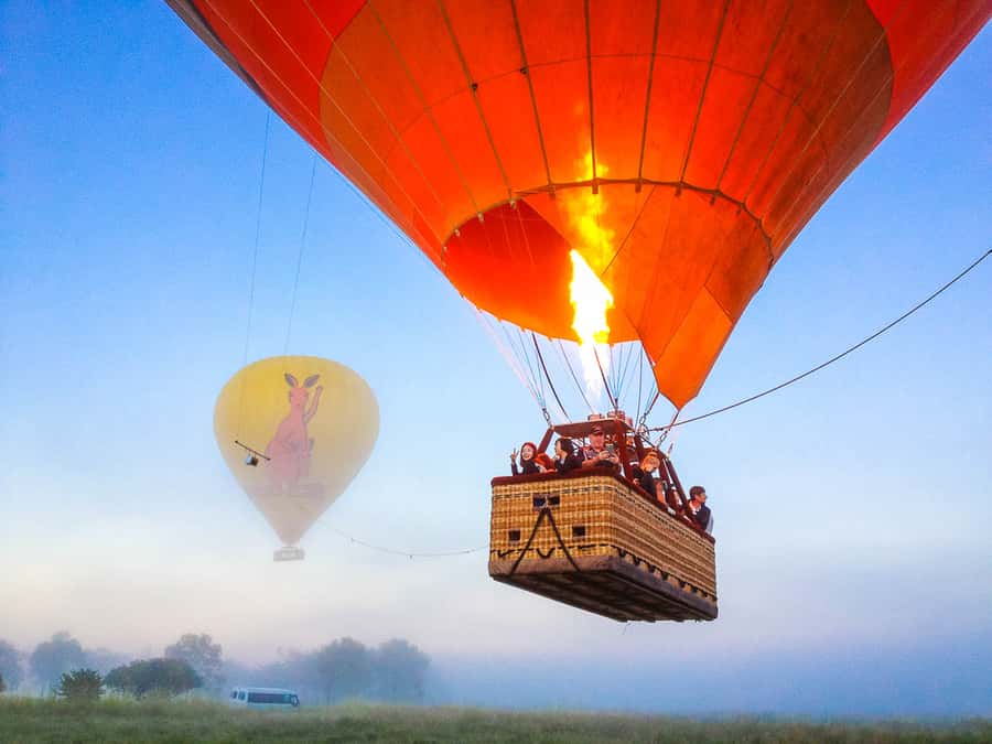 Cairns: Hot Air Balloon Flight with Transfers - Watching a balloon become a giant aircraft