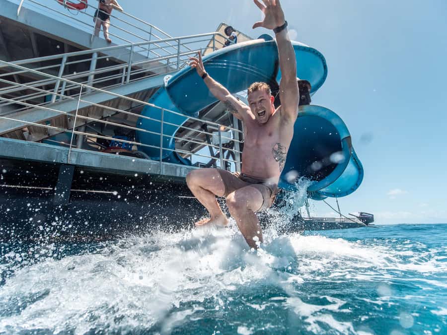 Cairns: Outer Great Barrier Reef Pontoon with Activities - The Waterslide and Sun Deck
