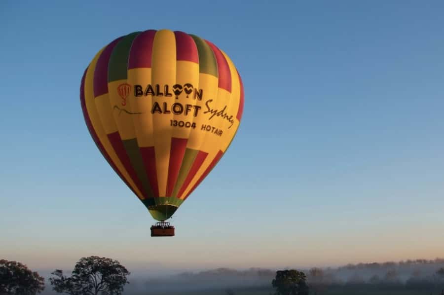 Camden Valley: Sunrise Hot Air Balloon Flight With Breakfast - Watching a colourful balloon come alive