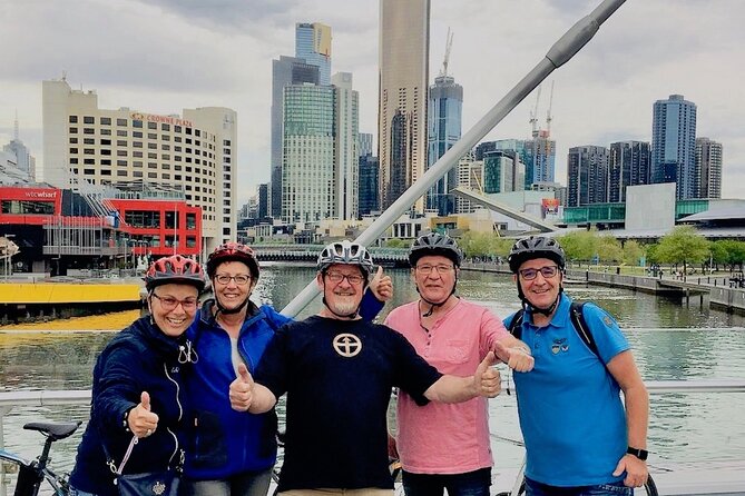 Famous Melbourne City Bike Tour - Laneways, street art, and heritage arcades