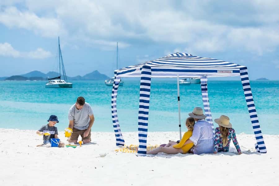 From Airlie: Whitsundays and Whitehaven Half-Day Cruise - Swimming, paddleboards, and beach time