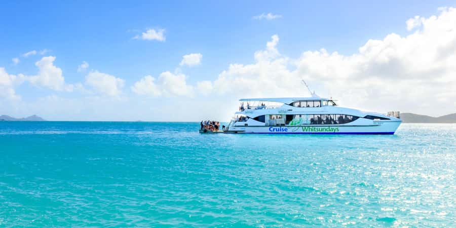 From Airlie: Whitsundays and Whitehaven Half-Day Cruise - Leaving Airlie Beach and crossing the islands