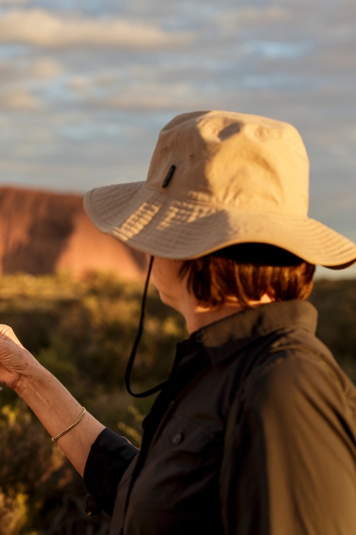 From Yulara: Uluru Tour and Sunset BBQ - Sunset at Uluru is the grand finish