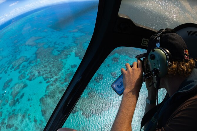 Full Day Reef Cruise and 10 Minute Helicopter Scenic Flight - Snorkeling, swimming, and scuba choices