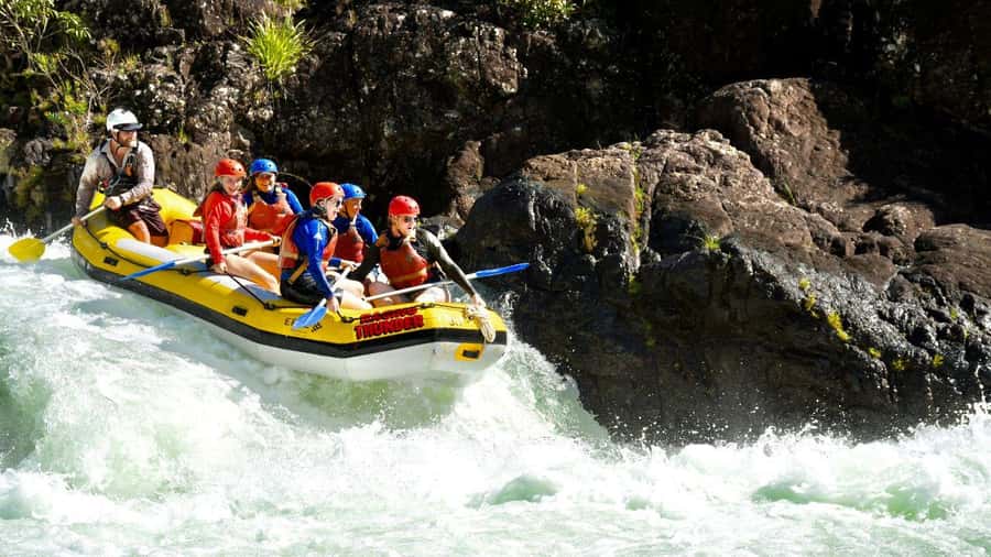 Full Day White Water Rafting From Cairns or Mission Beach - Getting ready at the launch point