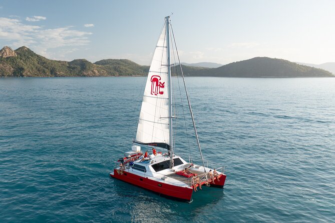 Full-Day Whitsunday Sail and Snorkel Adventure with Lunch - Snorkeling, beach time, and banana boat fun