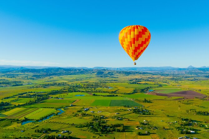 Gold Coast Hot Air Balloon + Winery Breakfast + Return Transfers - Landing and the hands-on balloon pack-up