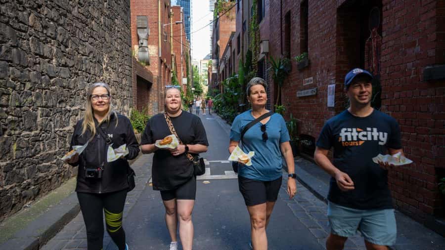 Melbourne: History and Donuts Walking Tour - Collins Street and the Mitre Tavern