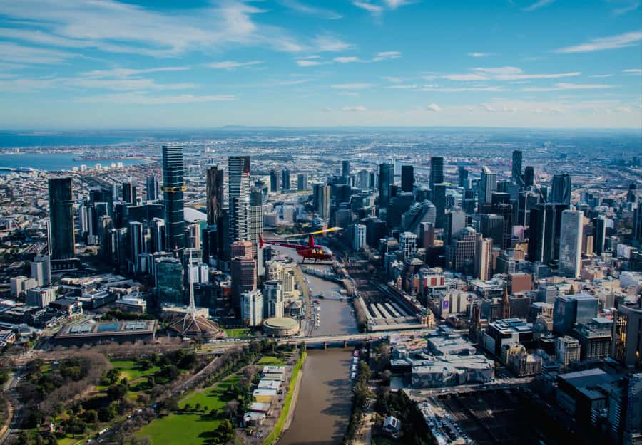 Melbourne: Private City & Beaches Helicopter Ride - Takeoff, headsets, and the first city views