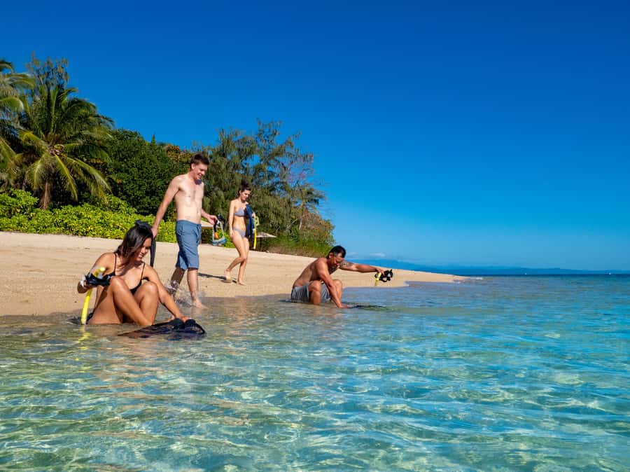 Port Douglas: Low Isles Glass Bottom Boat & Snorkeling Tour - Snorkeling the lagoon with crew support