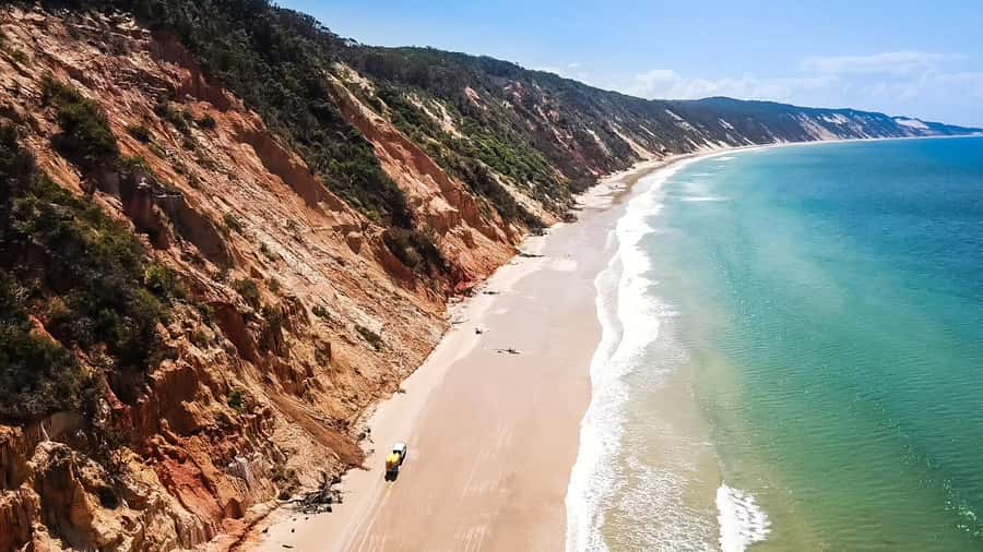 Rainbow Beach: Kayaking with Dolphins and Beach 4WD Tour - Kayaking around the headland