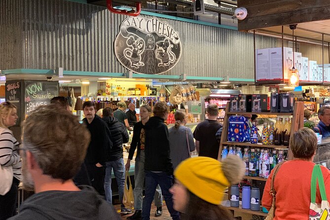 Small-Group Adelaide Central Market Early Breakfast Tour - Following a guide through the market
