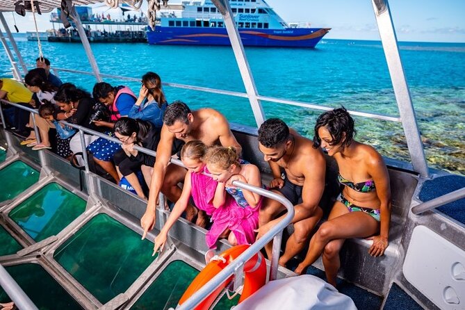 Sunlover Reef Cruises Cairns Great Barrier Reef Experience - Waterslide, sundeck, and family appeal