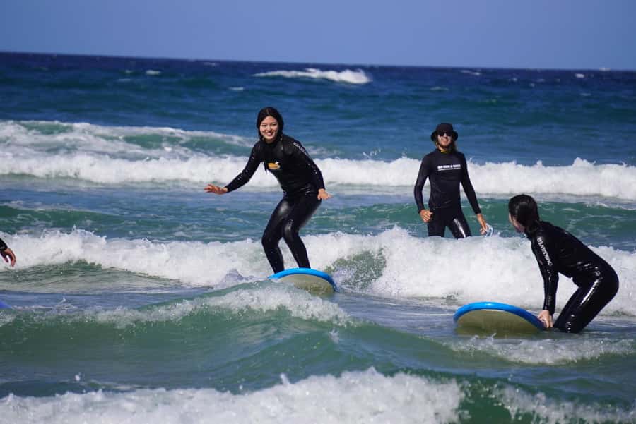 Surfers Paradise: 2 Hour Surf Experience on the Gold Coast - Into waist-deep water for the first rides