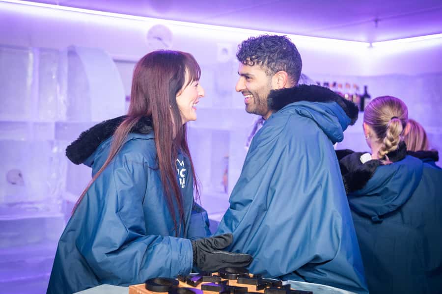 Surfers Paradise: IceBar Entry Ticket and Drink - Getting ready with gloves, boots, and a cape