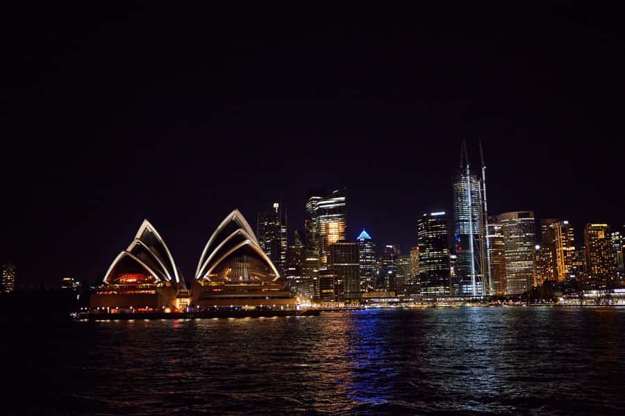 Sydney: Big Bus Panoramic Night Tour by Open-Top Bus - The return past the Opera House and Circular Quay