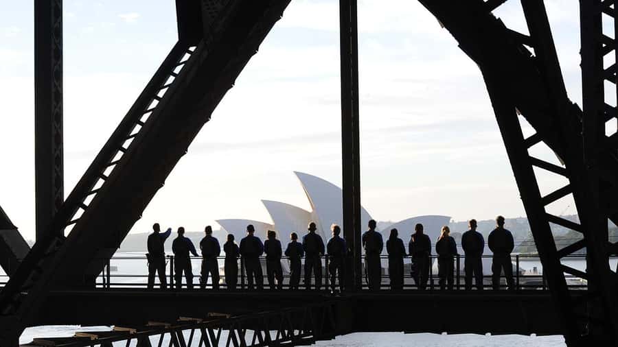 Sydney: Guided Daytime Summit Climb of Sydney Harbour Bridge - Moving slowly along the bridge arch