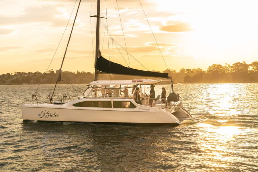 Sydney Harbour: Sunset Catamaran Cruise - Beneath the Harbour Bridge at changing light