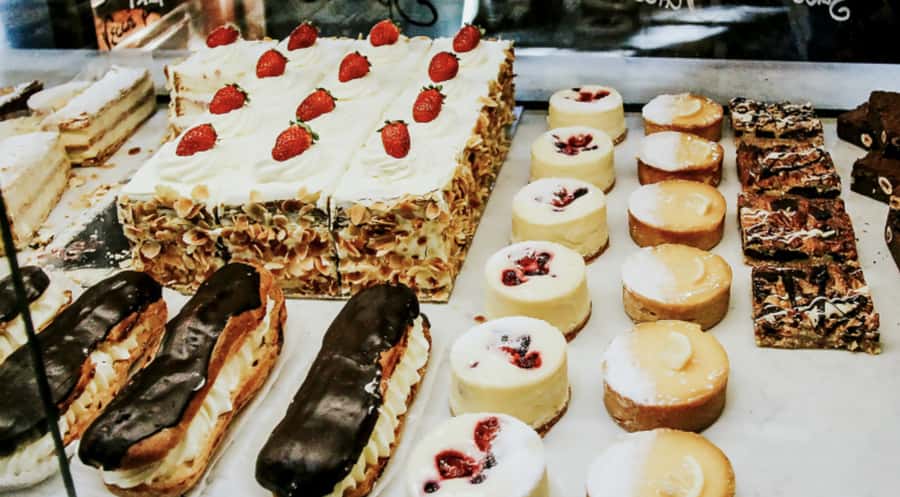 Taste of Melbourne: Local Laneways, Boroughs, Bites & Brews - Queen Victoria Market: cheese, traders, and a practical route change